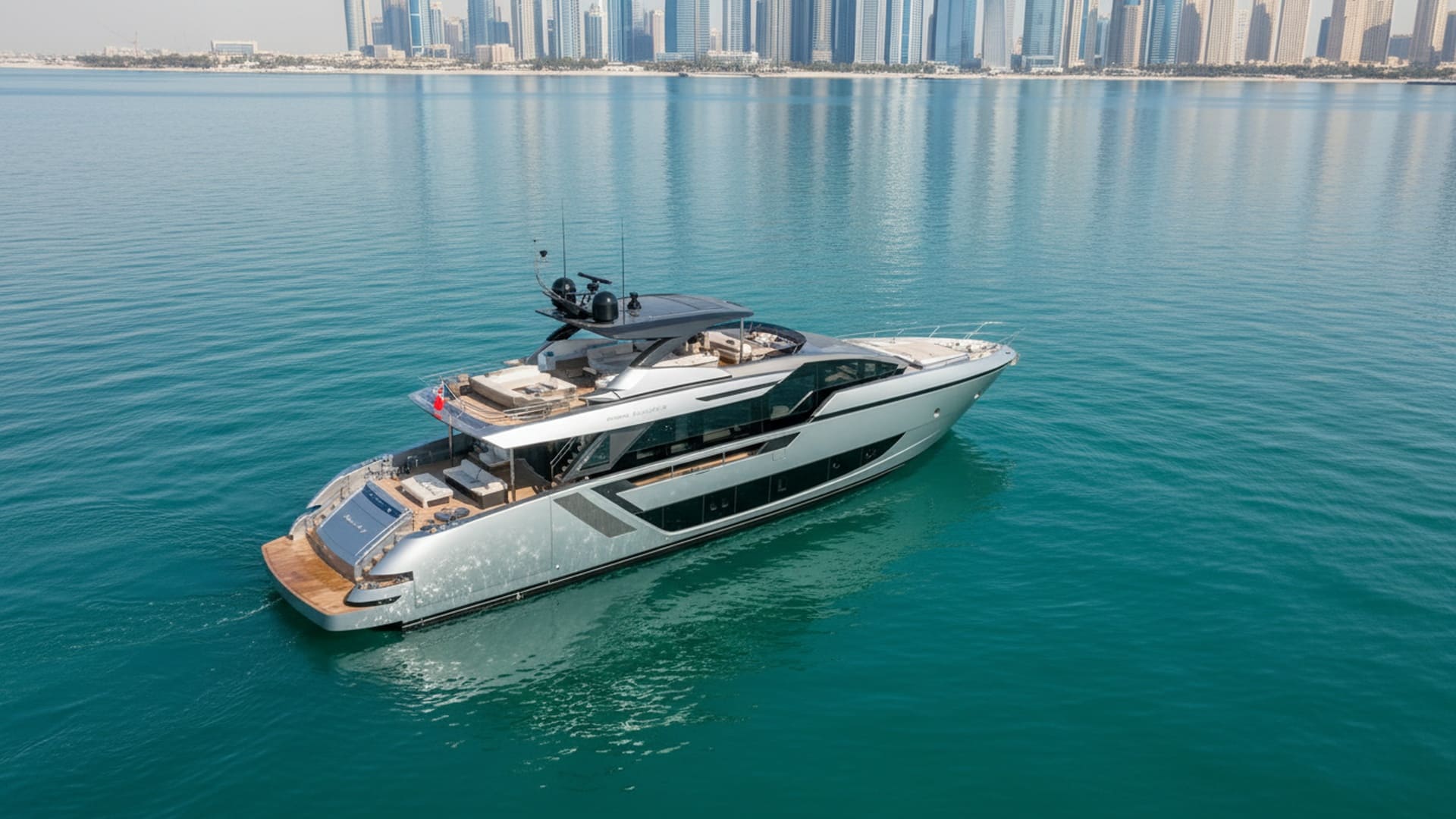 Aerial view of Crystal Voyager 82 ft cruising Dubai Marina