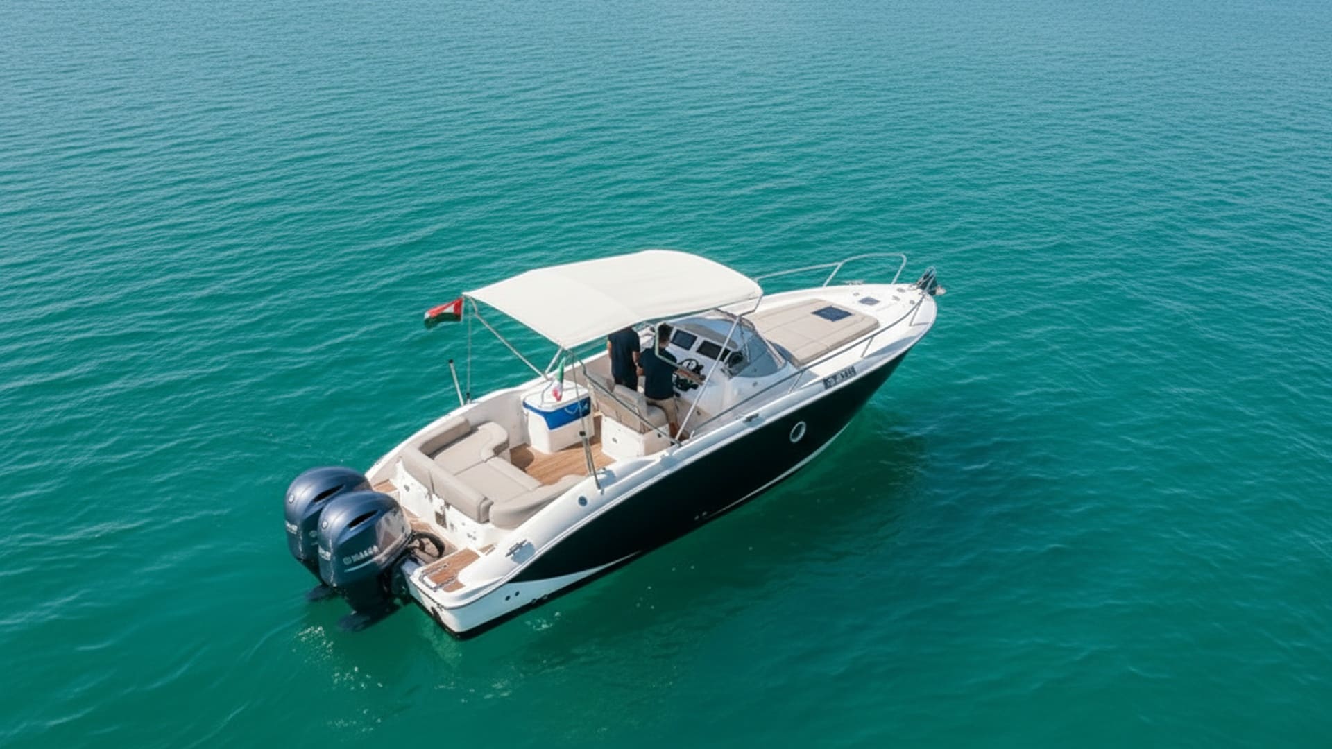 Aerial view of Ruby Sanctuary 27 ft cruising Dubai Marina